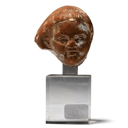 Testa di Arpocrate in terracotta di stile romano-e