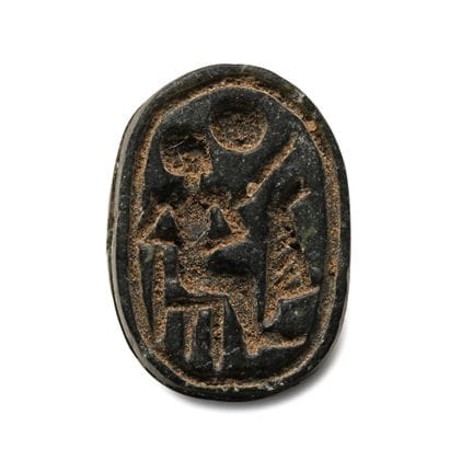 Egyptian Black Stone Scarab with Seated Figure. La