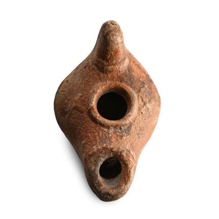 Lampada a olio romana in terracotta. III-IV secolo