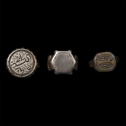 Western Asiatic Silver-Coloured Metal Ring Group. 
