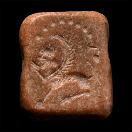 Westasiatische, beidseitig bearbeitete Amulettperl