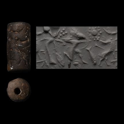 Assyrisches Zylindersiegel mit Tiermotiven. Um das
