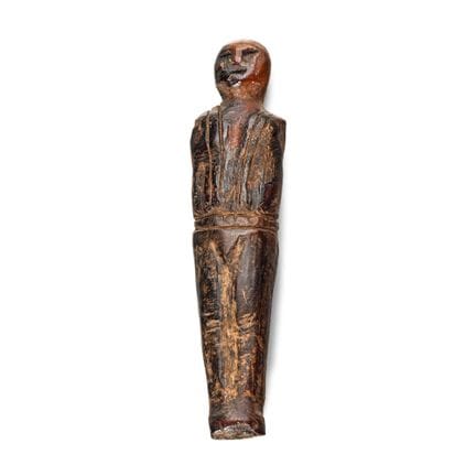 Figura tallada en hueso fosilizado de morsa, de or