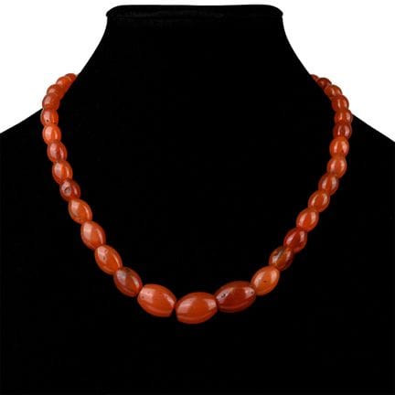 Collier de perles en cornaline de style romain. XX