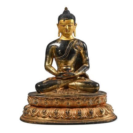Statue sino-tibétaine d'un Bouddha assis, dorée. X