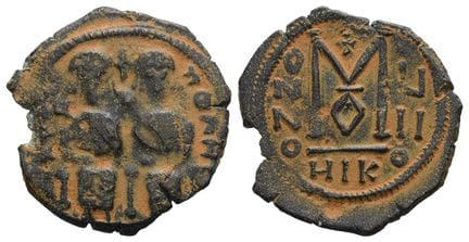 Follis en argent du califat omeyyade. . Follis en 