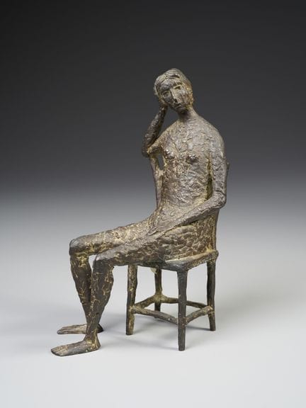 MANDELLI CARLO (1912 - 1975) DONNA SEDUTA. Bronzo.