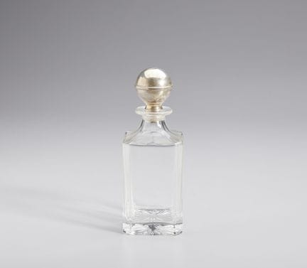 20TH-CENTURY SILVERSMITH Glass bottle with a circu