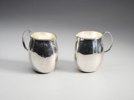 20TH-CENTURY ITALIAN SILVERSMITH A pair of single-
