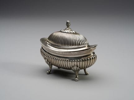 18TH-CENTURY SILVERWARE: Sugar bowl in embossed si