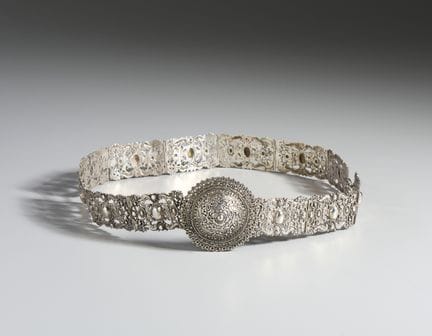20TH-CENTURY SILVERSMITH Embossed silver belt with