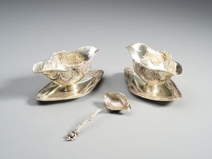 20TH-CENTURY SILVERSMITH A pair of boat-shaped sau