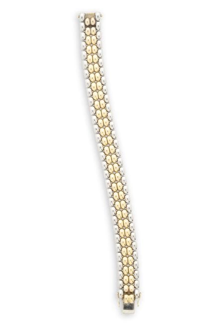 萧邦：手链，1990年代
这款双色砖形链节手链，刻有“Chopard Geneve”字样，编号811