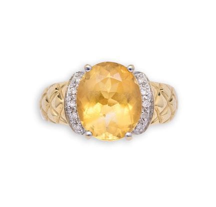 BAGUE EN CITRINE ET DIAMANTS 
sertie d'une citrine