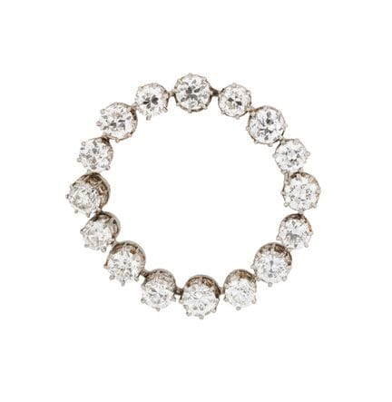 BROCHE CERCLE EN DIAMANT 
sertie de seize diamants