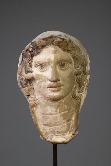 Fragment of an askos with a Gorgon’s head.
Large f