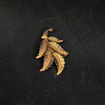 Broche en forma de ramo de oro de 750‰. 
Peso NETO