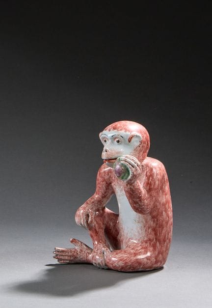 DELFT (dans le goût de)
Singe assis tenant un frui