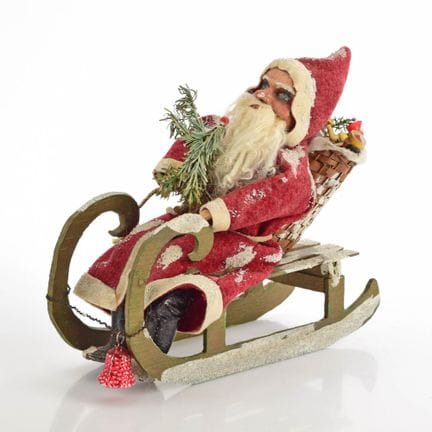 Clay and wood, painted; fabric; Santa Claus sittin