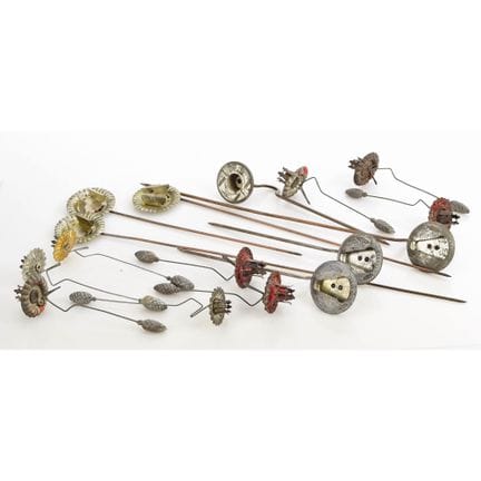 16 pieces total, metal, various designs: 7 with sc