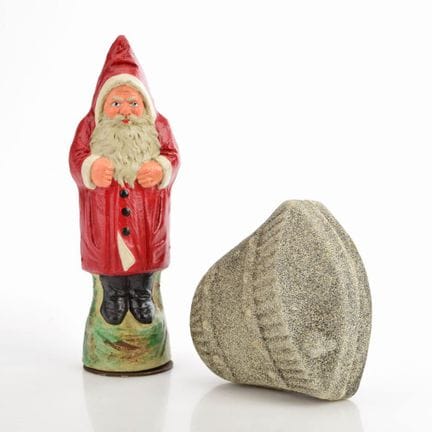 Embossed and colored cardboard; standing Santa Cla