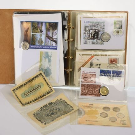 Included: 21 numismatic envelopes, mostly from the