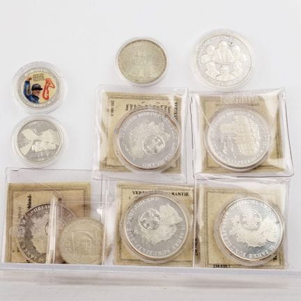 10 pieces total, various silver alloys, including: