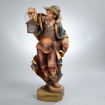 Sculpté dans le bois, sur un socle en relief, gard