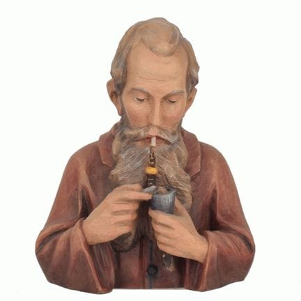 Bois, buste sculpté en relief, peint avec sobriété