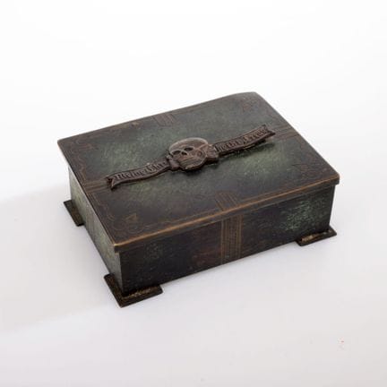 Non-ferrous metal, dark patina, surface partially 