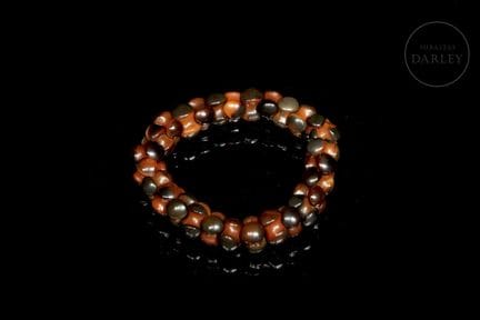 Zeremonielles, gelenkiges Armband, bestehend aus a