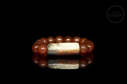 A ritual bracelet composed of fourteen spherical r