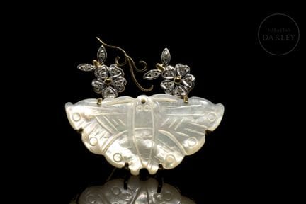 Brosche aus 18 Karat Gelbgold und Diamanten. Sie b