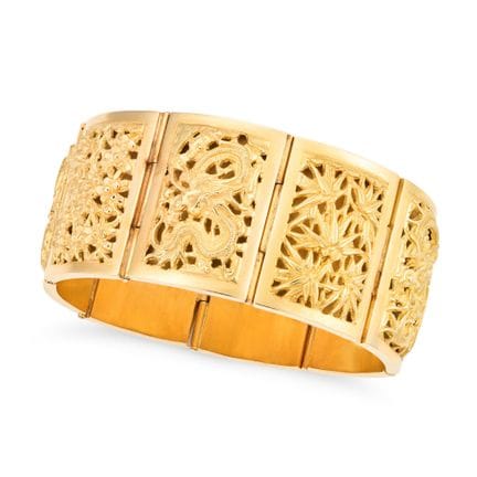 Ein VINTAGE-ARMBAND MIT GOLDENEN DRACHEN aus 18-ka