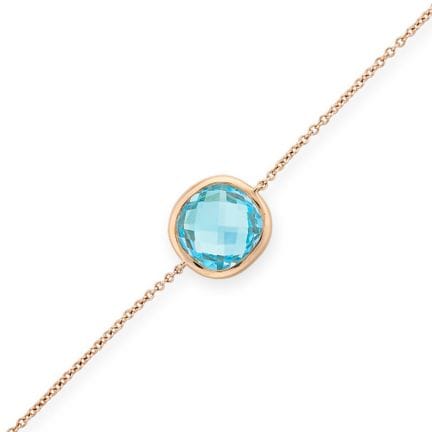 BUCHERER, BRACELET EN TOPAISE BLEUE en or rose 18 