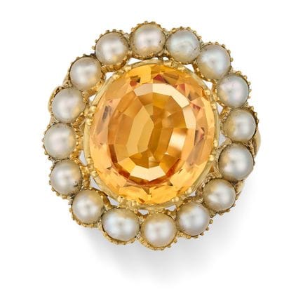 UNE MAGNIFIQUE BAGUE ANTIQUE ORNÉE D'UNE TOPAZE IM