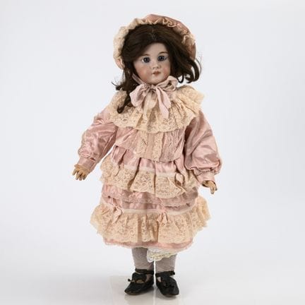 Französische Puppe in rosafarbenem Kleid. Jumeau. 