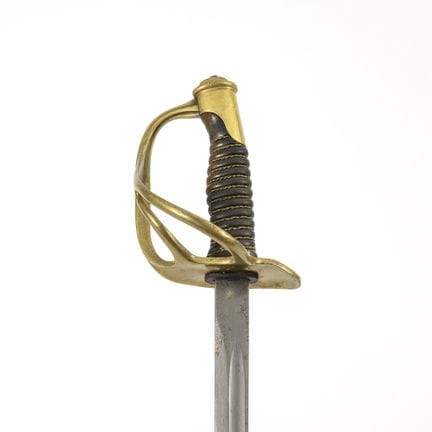 Espada de tres trazas con vaina.  

Probablemente 