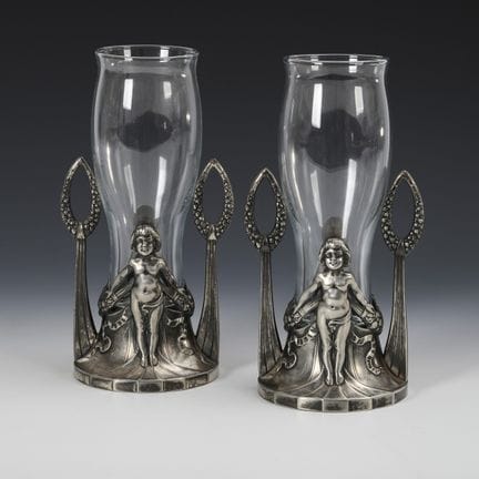 Pair of figurative Art Nouveau vases. WMF.  
 

 M