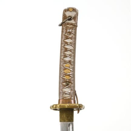 Katana militaire.  

Poinçons sur la virole en cui