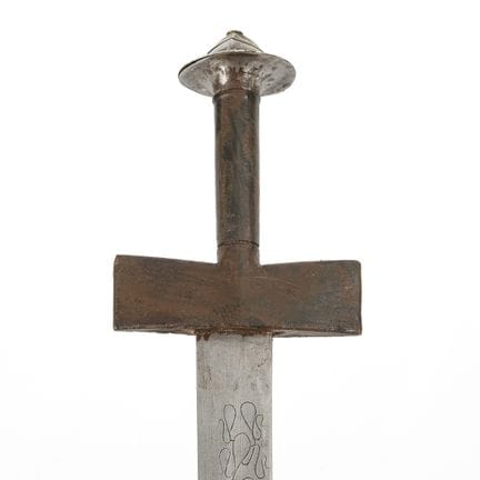 Espada norteafricana con vaina de cuero.  

 
 

L