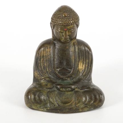 Buddha in Meditationshaltung.  
 

 
  
 

 Metall
