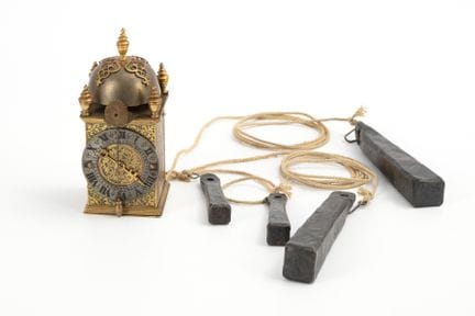 Baroque-style ticking clock.  

 
 

With spindle 
