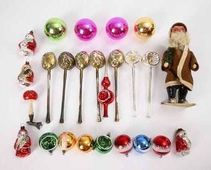 An old Santa Claus and some Christmas tree ornamen