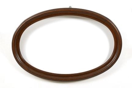 Oval solid wood frame.  
 

 
  
 

 External dime
