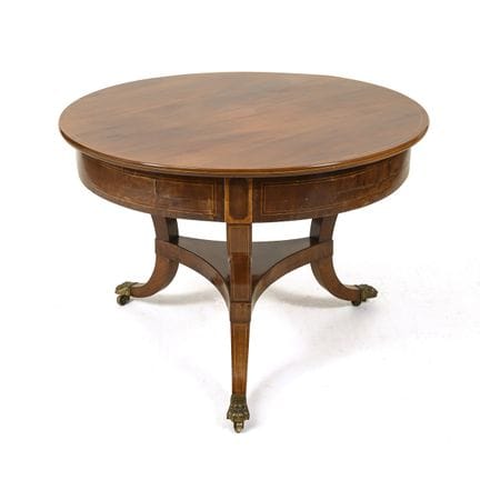 Round Biedermeier table on casters.  
 

 Circa 18