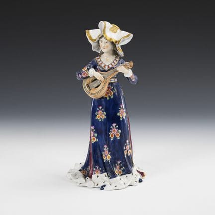 Dame de la Renaissance avec une mandoline.  

Marq