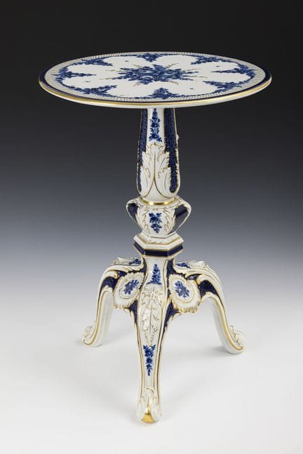 Porcelain table with floral decoration. Schierholz