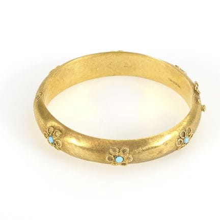 Armreif mit Blütendekor.  
 

 
  
 

 Gelbgold 75