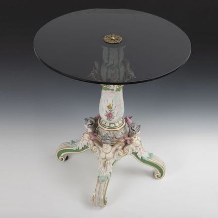 Porcelain table with Glass top.  
 

 Imitation sw